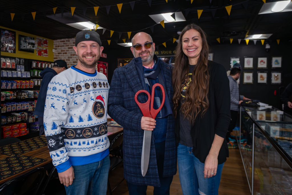 Keven LeBlanc, Mayor of Herndon with Goatz Sportz Cardz owners, Bryan and Ashley Janick