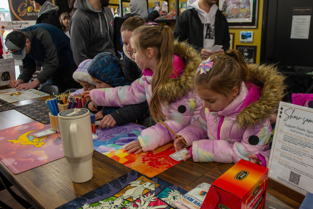 Children coloring their very own trading card at Goatz Sportz Cardz