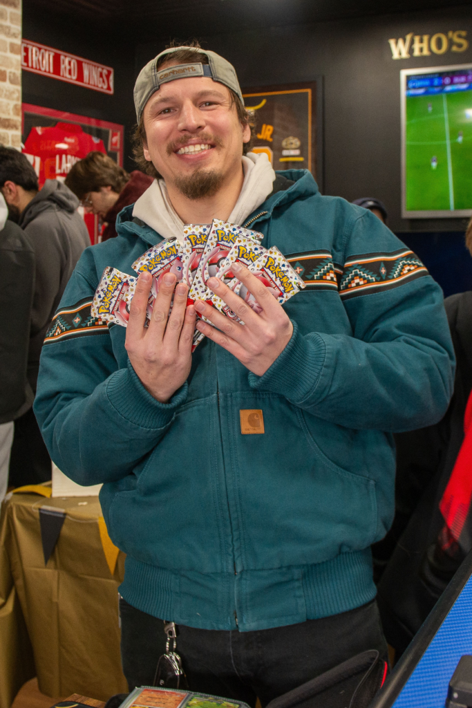 One customer feeling lucky to find some Pokemon packs