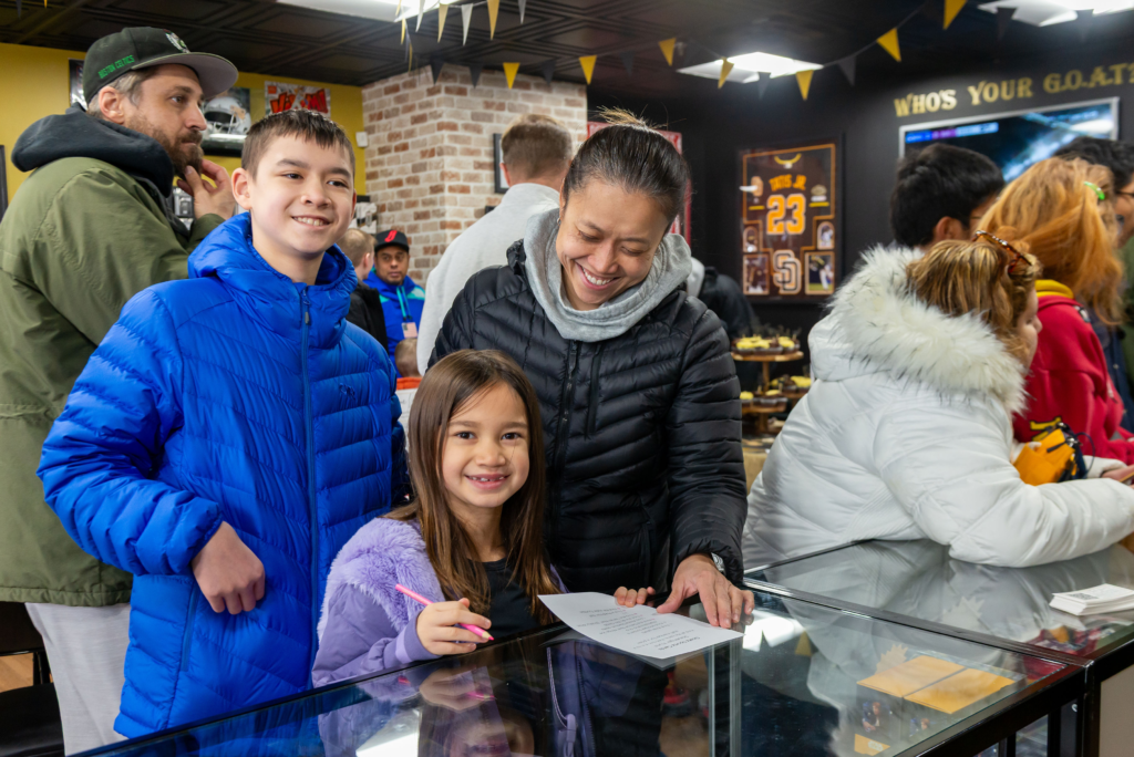 Children participating in a scavenger hunt at Goatz Sportz Cardz