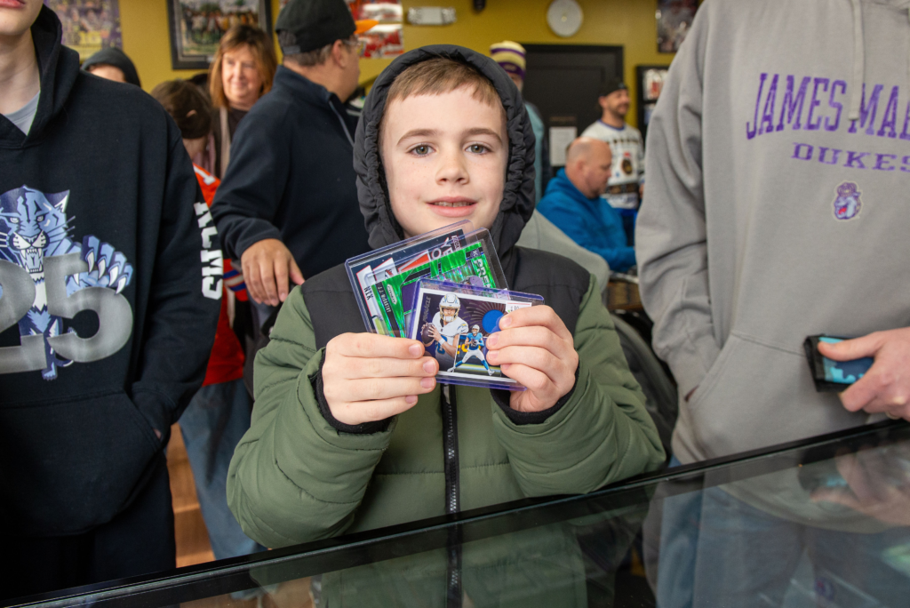 One of our younger collectors showing off his sports cards