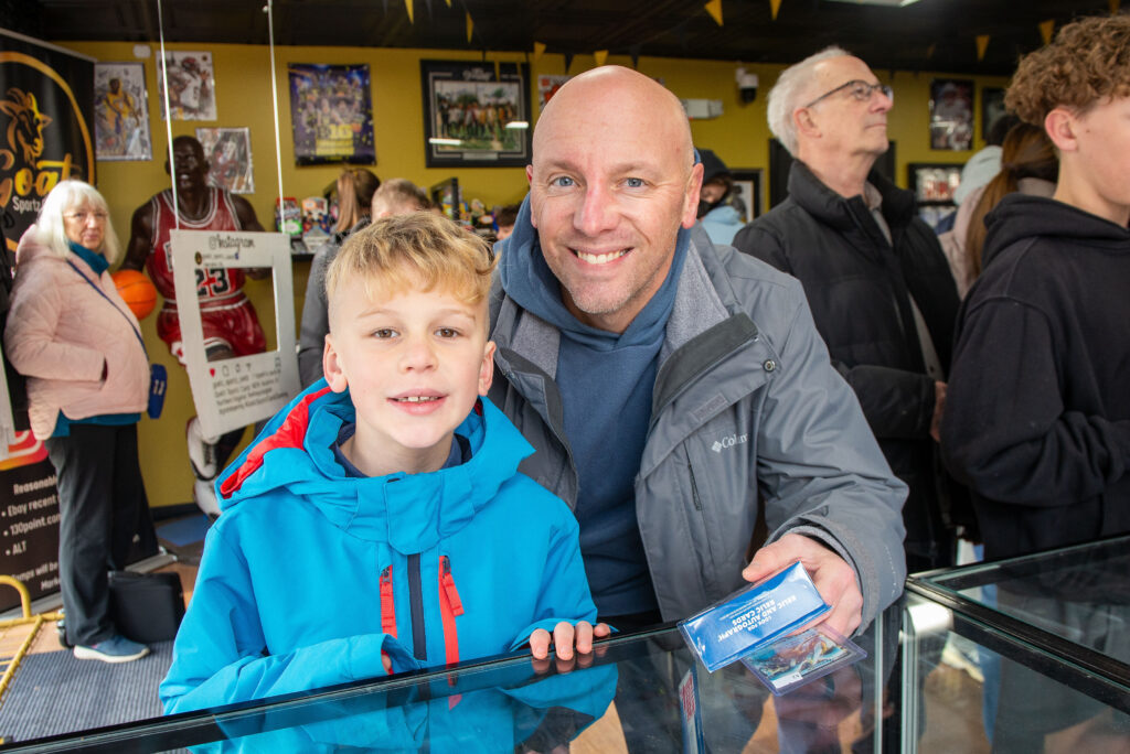 Son and dad spending some time at Goatz Sportz Cardz grand opening
