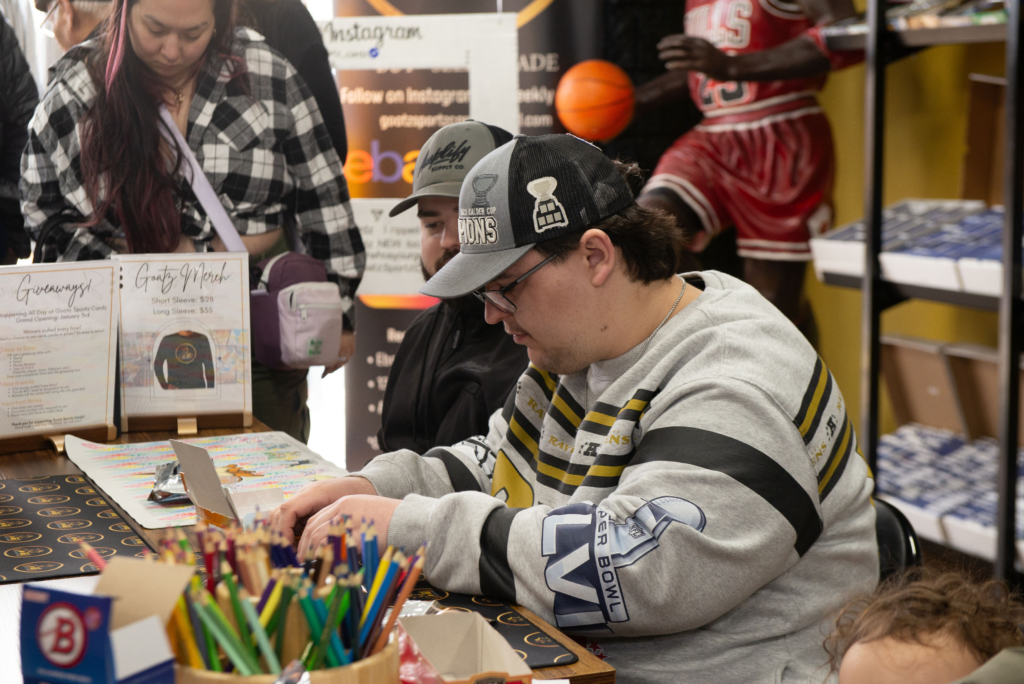 Customers ripping boxes at the table
