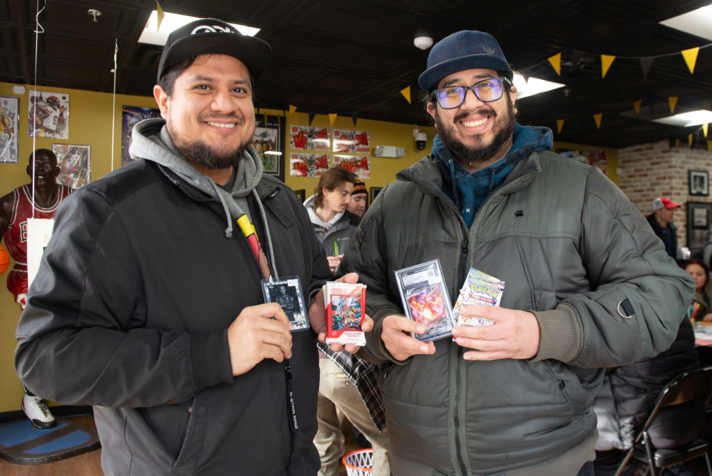 Customers showing off their cards purchases