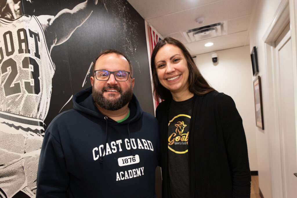 One of the owners posing for a photo opportunity with friends