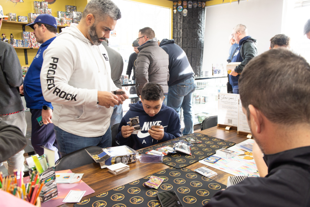 One of our younger collector's disbelief as he rips some football packs