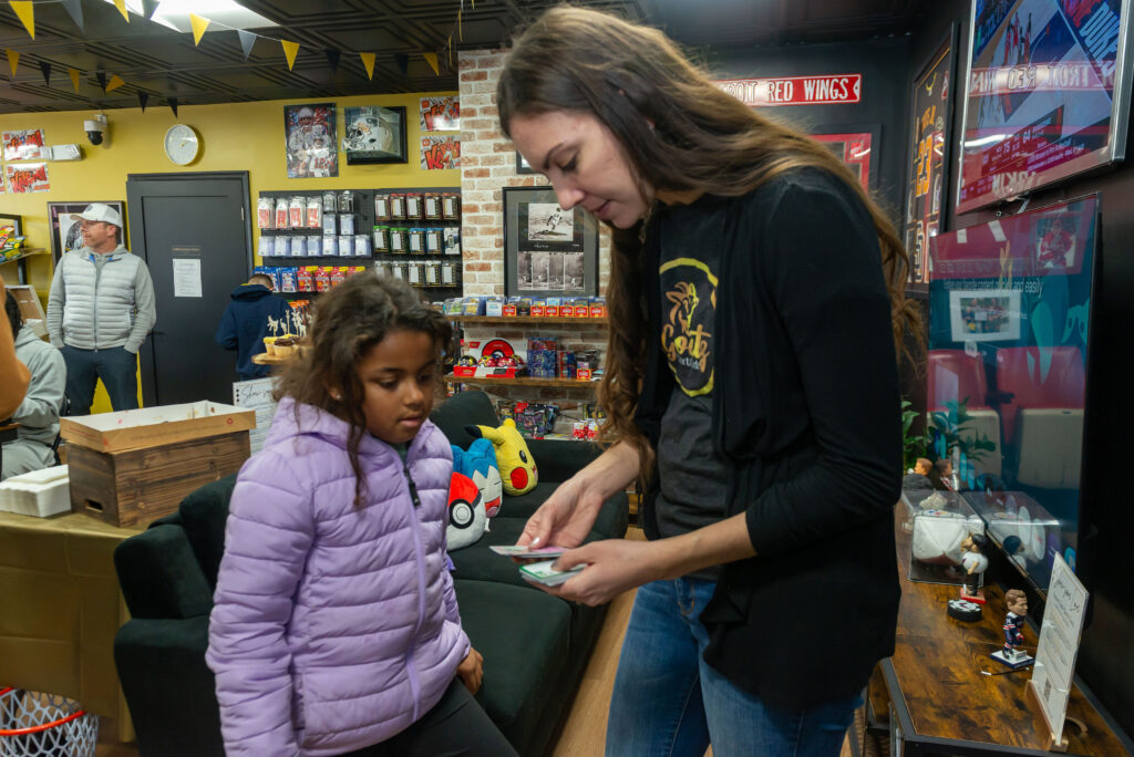 One of our younger collectors shows off her favorite pulls